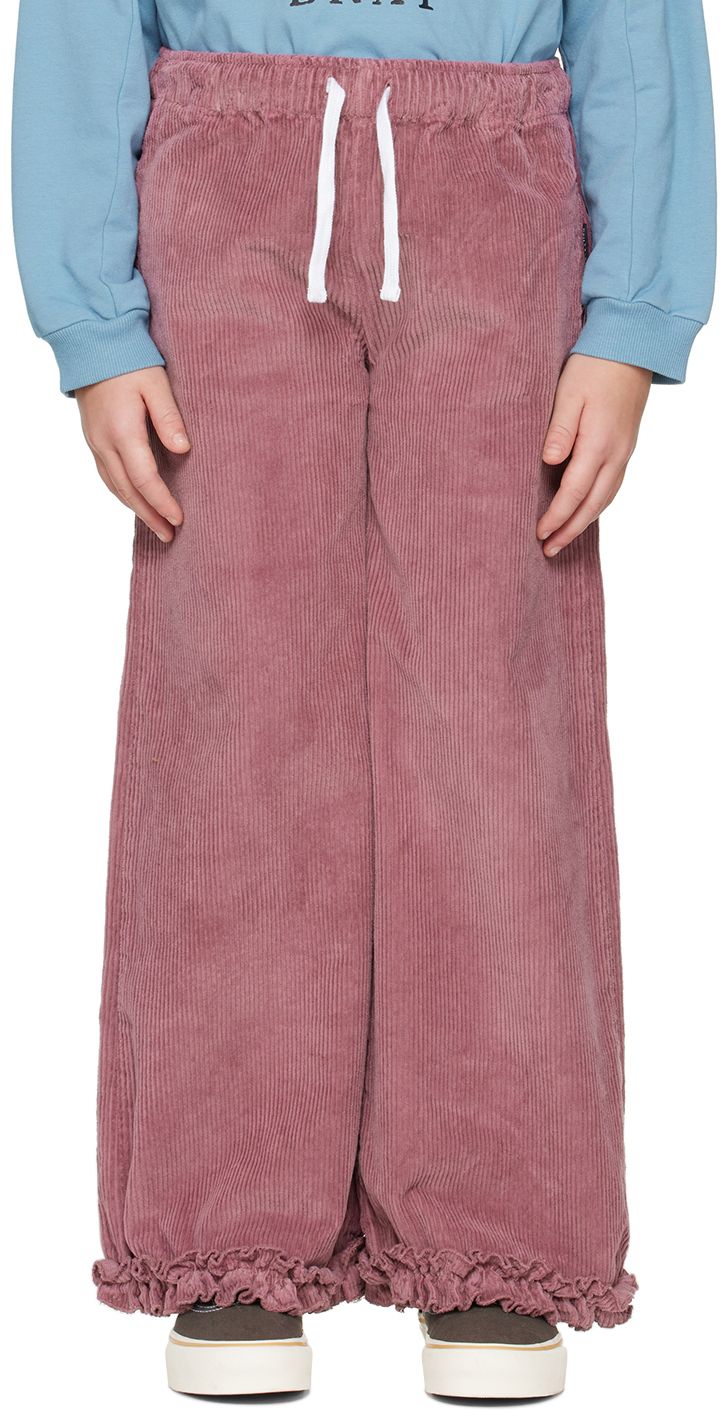 Stretch cotton corduroy trousers. · Drawstring at elasticized waistband · Two-pocket styling · Ruffled trim at cuffs · Machine-wash Supplier color: Happy mauve Model measures 54.5 / 138.4 cm tall and wears size 8-10Y. Size: child's height 1-2Y: 32-35.75 / 81.3-90.8 cm 2-3Y: 35.75-38.5 / 90.8-97.8 cm 3-4Y: 38.5-41.25 / 97.8-104.8 cm 4-5Y: 41.25-44.25 / 104.8-112.4 cm 5-6Y: 44.25-46.75 / 112.4-118.7 cm 6-8Y: 46.75-52.25 / 118.7-132.7 cm 8-10Y: 52.25-55.25 / 132.7-140.3 cm 10-12Y: 55.25-58.5 / 140. Corduroy Trousers, Ruffle Trim, Stretch Cotton, Apparel Accessories, Cold Shoulder Dress, Trousers, Outfit Accessories, Purple, Pants