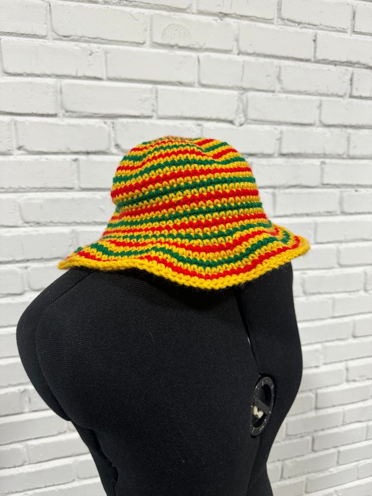 Made to order crochet bucket hat in Jamaican Rasta Colors. Perfect for gifting or vacations! One size, unisex adult hat sizing Casual Crochet Straw Hat, Adjustable Crochet Hat With Curved Brim In Cotton Yarn, Adjustable Cotton Yarn Crochet Hat With Curved Brim, Casual Cotton Yarn Crochet Hat For Vacation, Casual Crochet Cotton Hat For Vacation, Adjustable Crochet Bucket Hat With Curved Brim, Knitted Adjustable Bucket Hat For Vacation, Cotton Yarn Crochet Hat For Vacation, Crochet Vacation Hat, One Size Fits Most