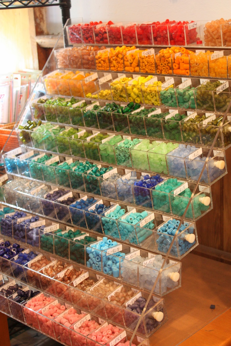 a display case filled with lots of different colored candies