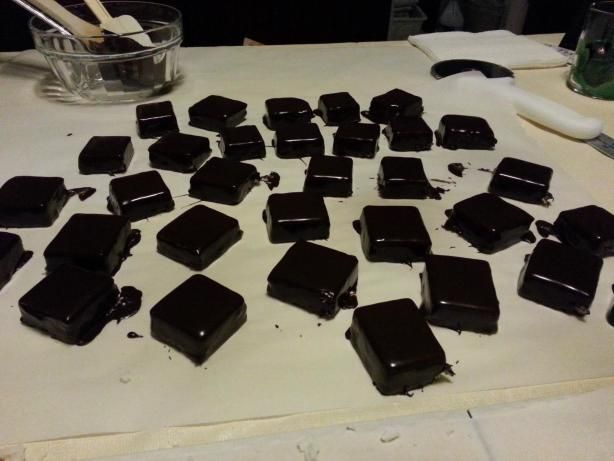 there are many pieces of chocolate on the table