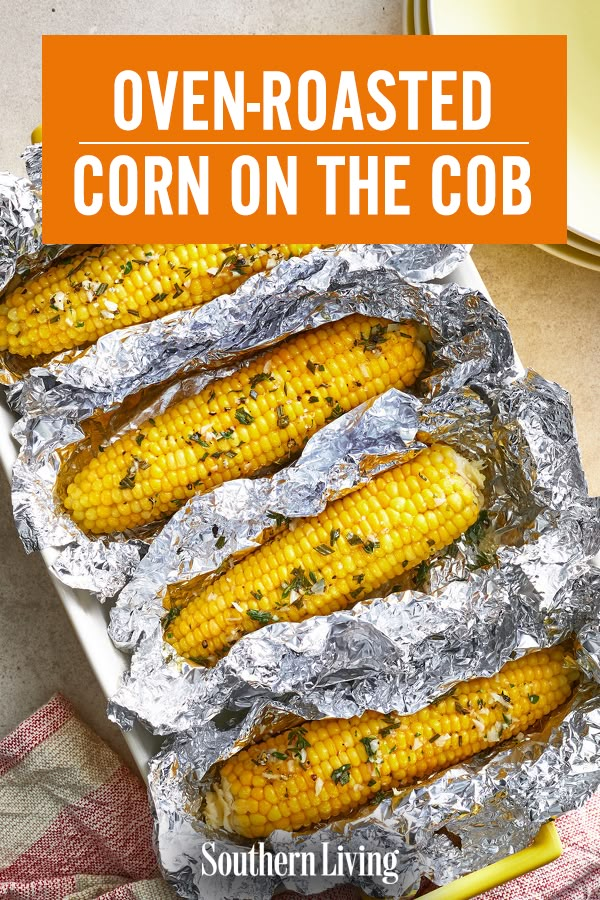 grilled corn on the cob in foil with text overlay that reads oven roasted corn on the cob