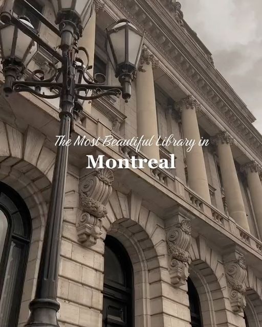 a street light sitting in front of a tall building with columns on the side and words that read, this most beautiful library in monteal