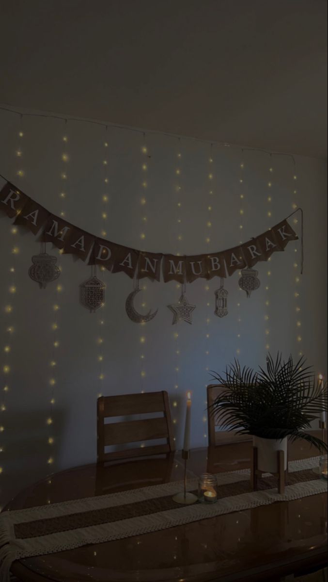 a table with two chairs and lights on it