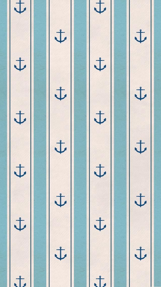 blue and white striped wallpaper with an anchor pattern on the bottom half of it