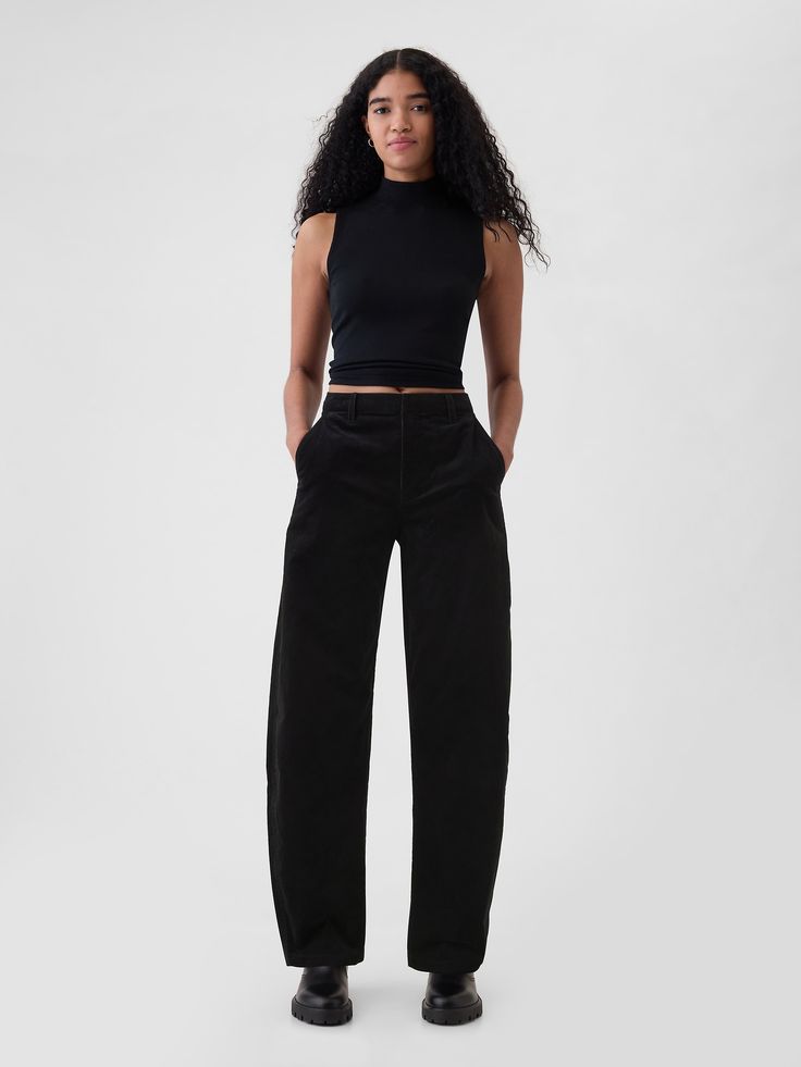 Soft corduroy tapered trousers.  Concealed hook and bar closure, zip fly.  Front slant pockets, back welt pockets.  Fit: Classic.  An easy silhouette that fits close at the waist, and is relaxed through the hips and thigh.  High rise.  Tapered leg.  Models wearing Gap