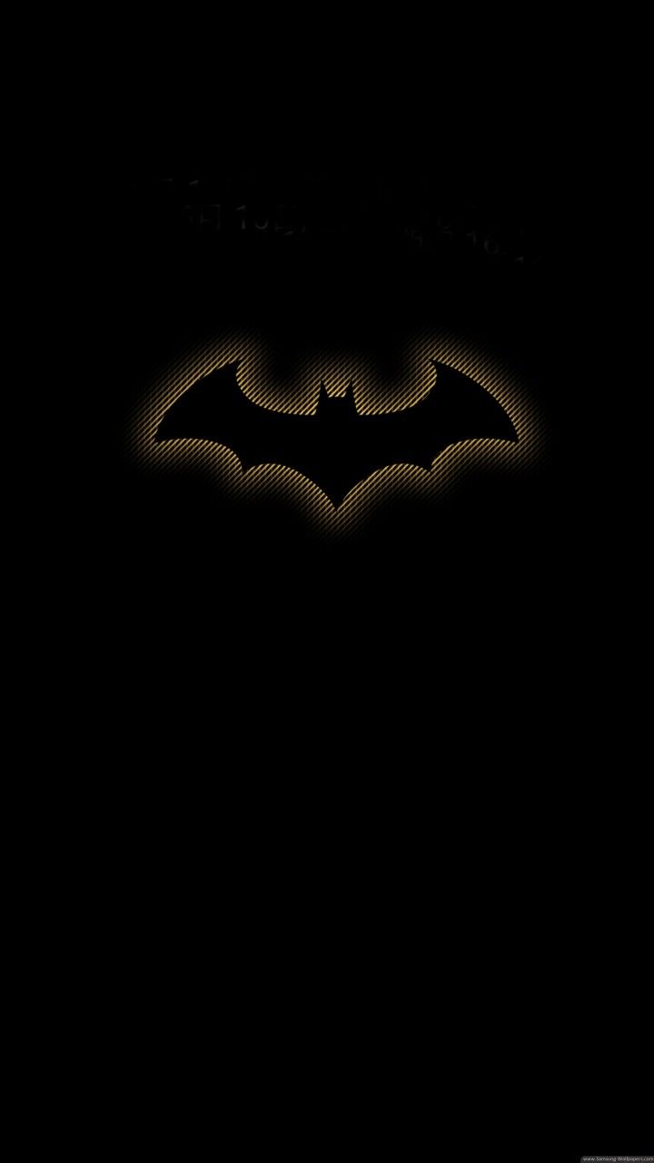 the dark knight rises wallpaper with batman symbol on it's chest and back