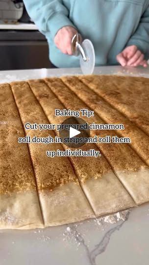 a person is making bread on a table with words written in front of the image