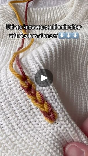 someone is knitting a sweater with two colors at once