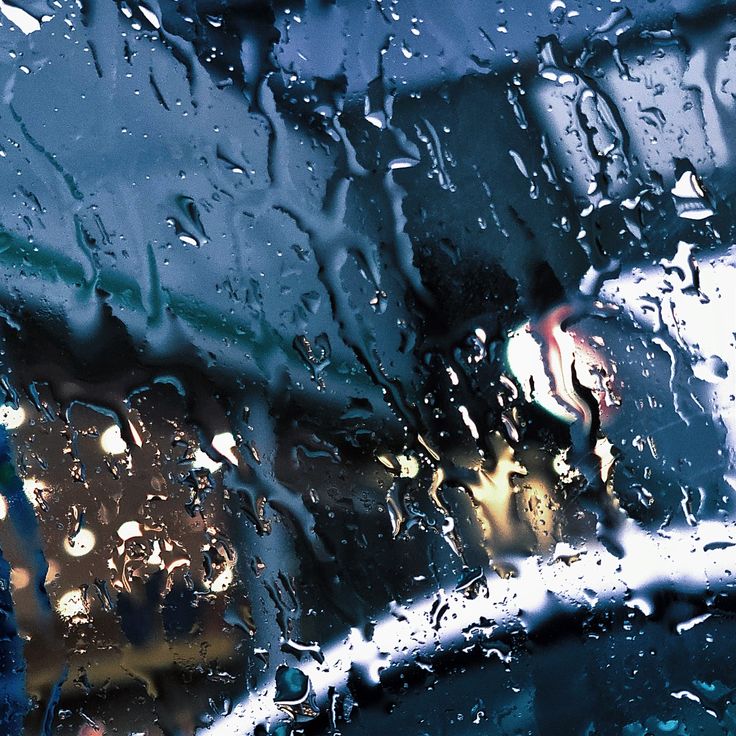 rain drops on the windshield of a car