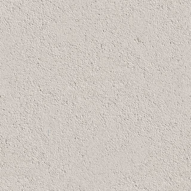 a white stucco wall textured with cement