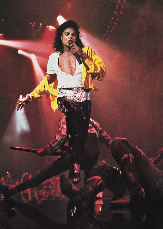 michael jackson performing on stage at a concert