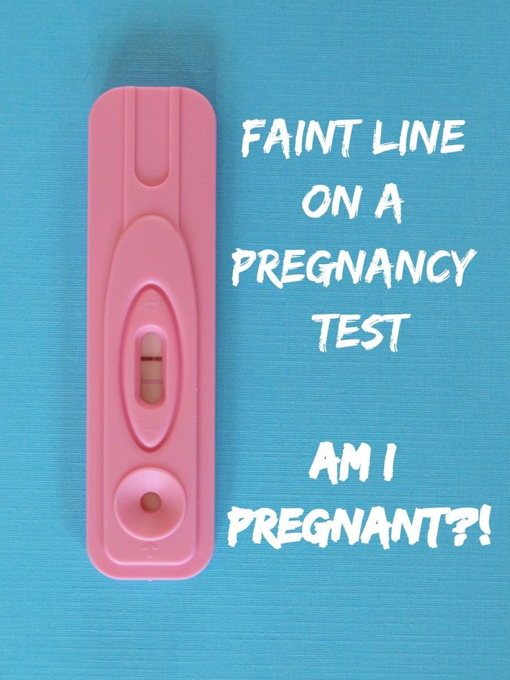 a pink toothbrush with the words faint line on a pregancy test am i pregnant?