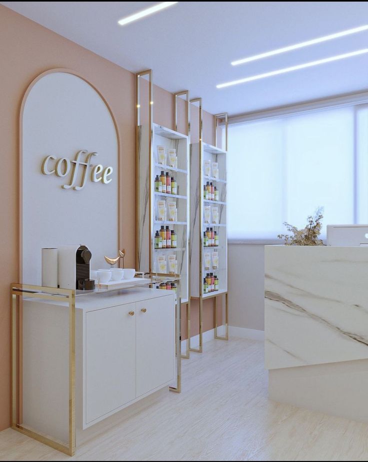 the interior of a coffee shop with white marble countertops and gold trimmings