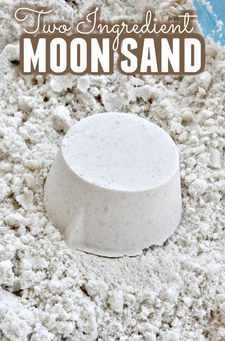 two ingredient moon sand in a blue bowl with the words, two ingredient moon sand