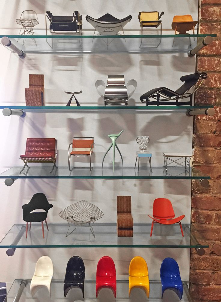 the shelves are filled with different types of chairs