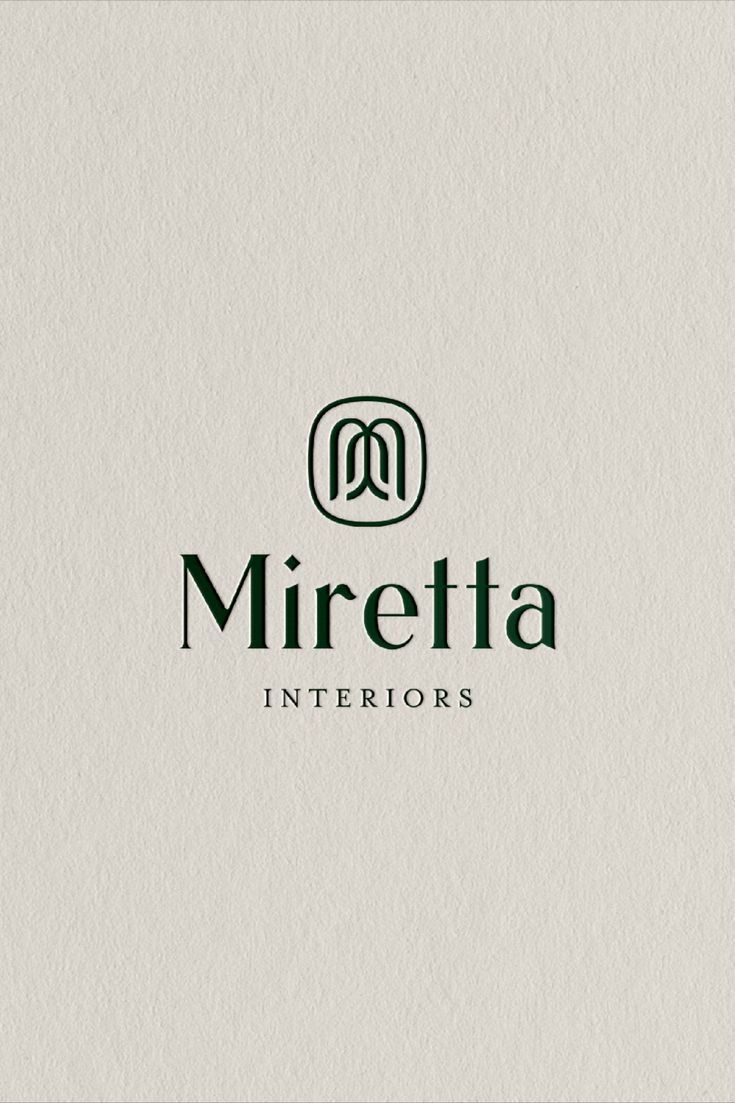 the logo for mirretta interiors is shown in green and white colors on a beige background