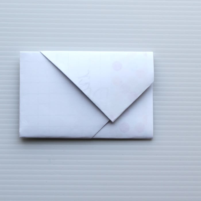 an origami envelope on a white background