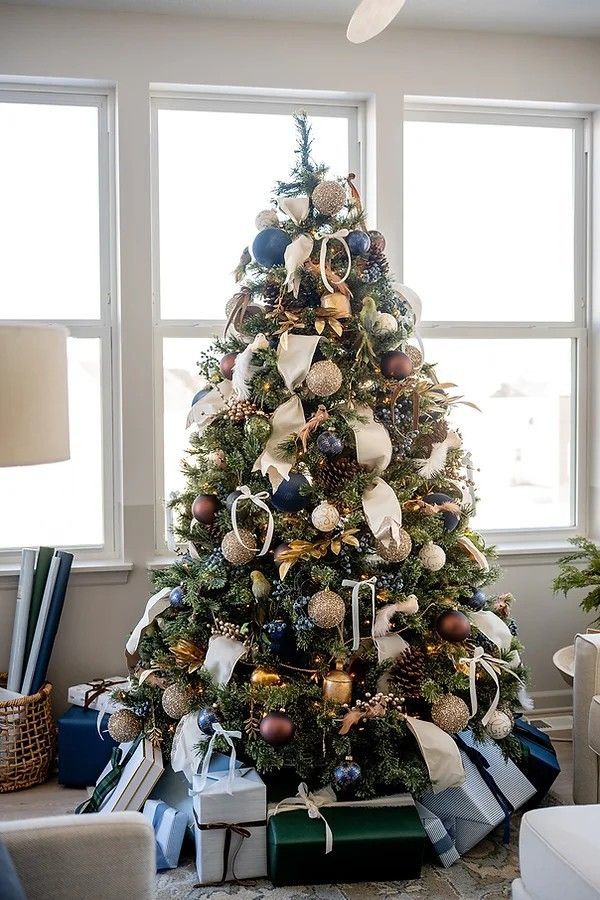 a decorated christmas tree in a living room