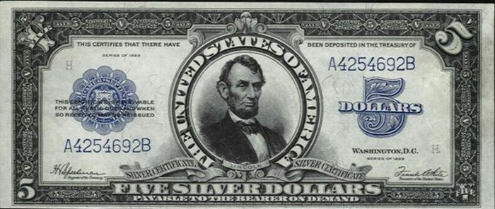 an old five dollar bill with the image of abraham lincoln on it's back