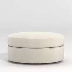 a white round ottoman sitting on top of a floor