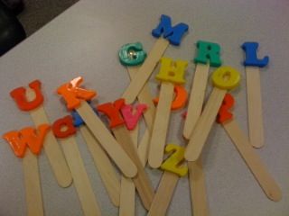 several popsicles with the word march spelled out in different colors and letters on them