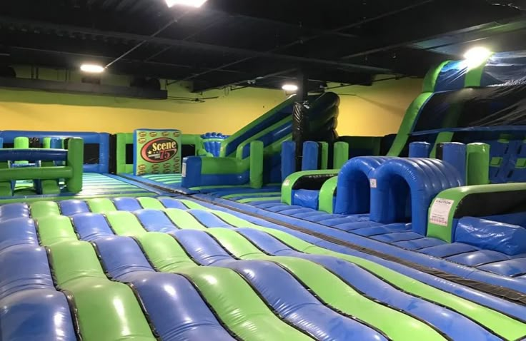 an inflatable water slide is set up for kids to play