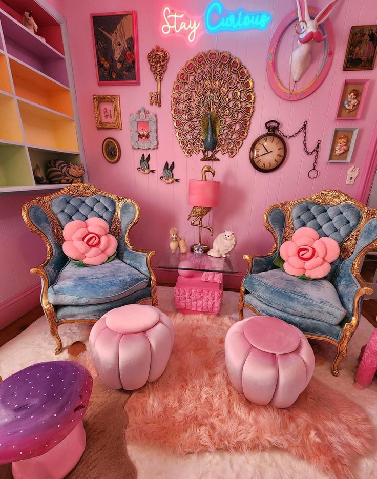 a living room filled with furniture and pink walls