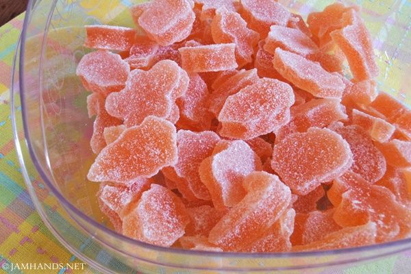 a bowl filled with sugary candies on top of a table