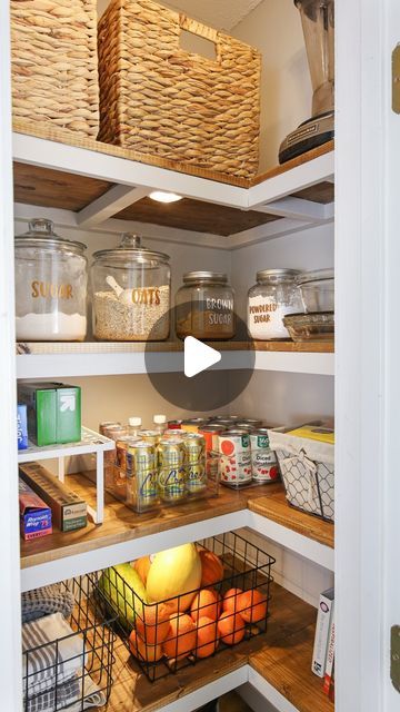 an open pantry with lots of food in baskets on the shelves and other items inside