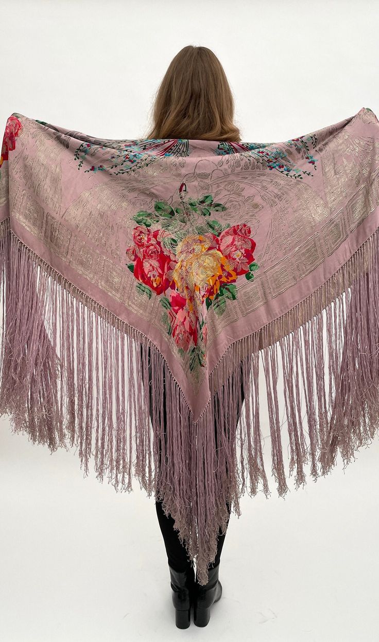 "I have been collecting 1920s lamé shawls for many years and I have never seen an example of this design in this rare colour before. It is a soft and subtle pale lilac to pale pink colour which is combined with gold metallic thread and a floral design in shades of blue, green, yellow and red. I think that the listing photos give a good indication of the actual colours of the shawl. It has long fringing to each side which moves beautifully when it is worn. This shawl is reversible so can be worn both ways, it is shown here on both sides. It's a super piece of antique clothing and textile history.  When laid flat it measures approximately 52\" inches by 51\" inches excluding the fringing which is 17\" inches long on each side. It's in very good overall condition, on close inspection there ar Pink Silk Vintage Scarves, Pink Vintage Silk Scarves, Vintage Pink Shawl Scarf, Vintage Pink Shawl Scarves, Pink Vintage Shawl Scarf, Vintage Pink Silk Scarf, Vintage Pink Silk Shawl Scarf, Pink Vintage Silk Shawl Scarf, Pink Vintage Silk Shawl