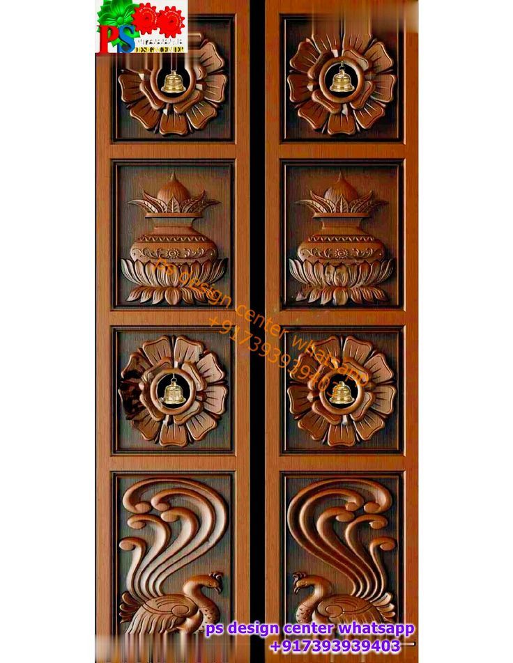 an ornate wooden door with decorative carvings on it