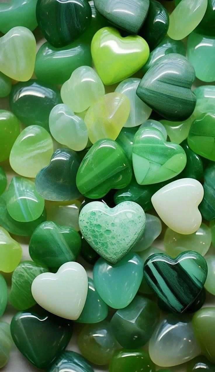 many green and white heart shaped rocks together