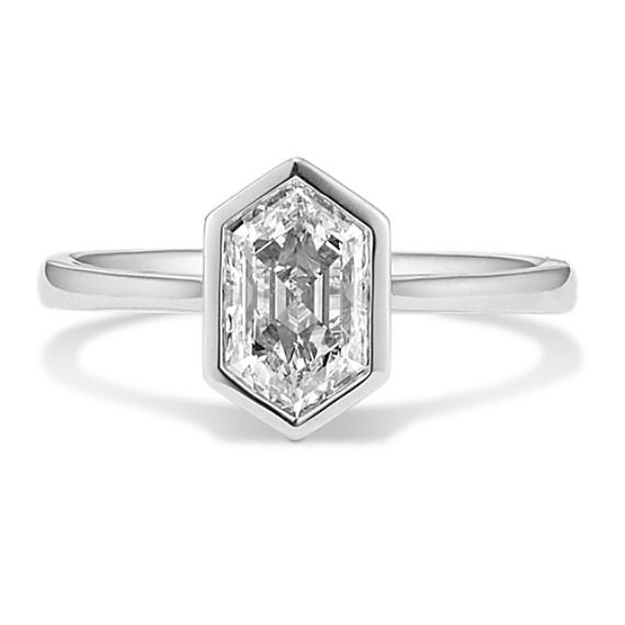 a white gold ring with an octagonal cut diamond