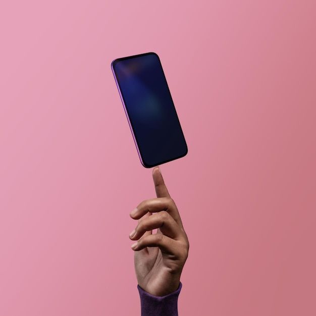 a person holding up a cell phone in the air with their finger pointing at it