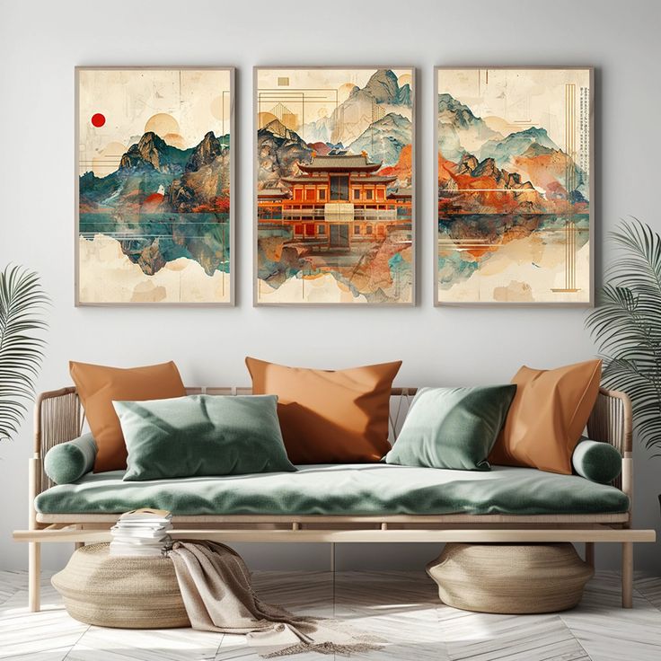 a living room with two paintings on the wall and a couch in front of it