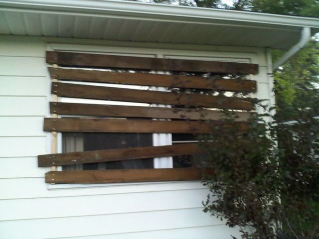 the window is made out of wooden slats