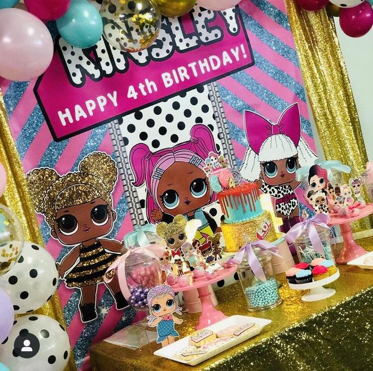 a birthday party with lol dolls and balloons