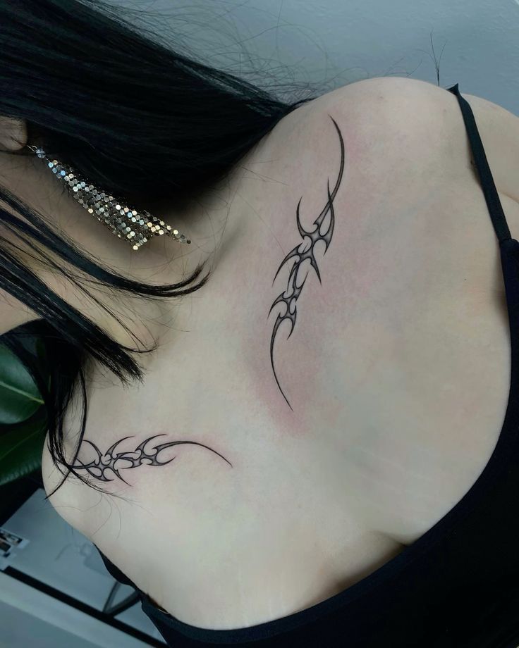 a woman with a tattoo on her back