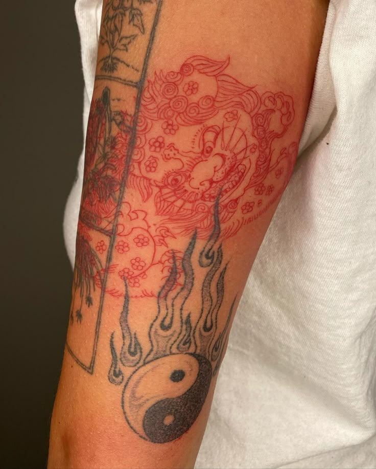 a person with a tattoo on their arm