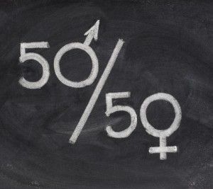 a chalkboard with the word 50 and fifty written in white on it next to an arrow