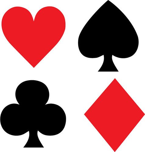 four card suits with hearts and spades