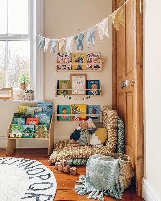 a child's room with bookshelves and toys