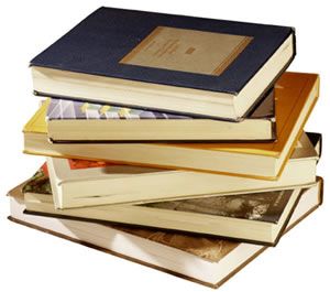 a stack of books sitting on top of each other