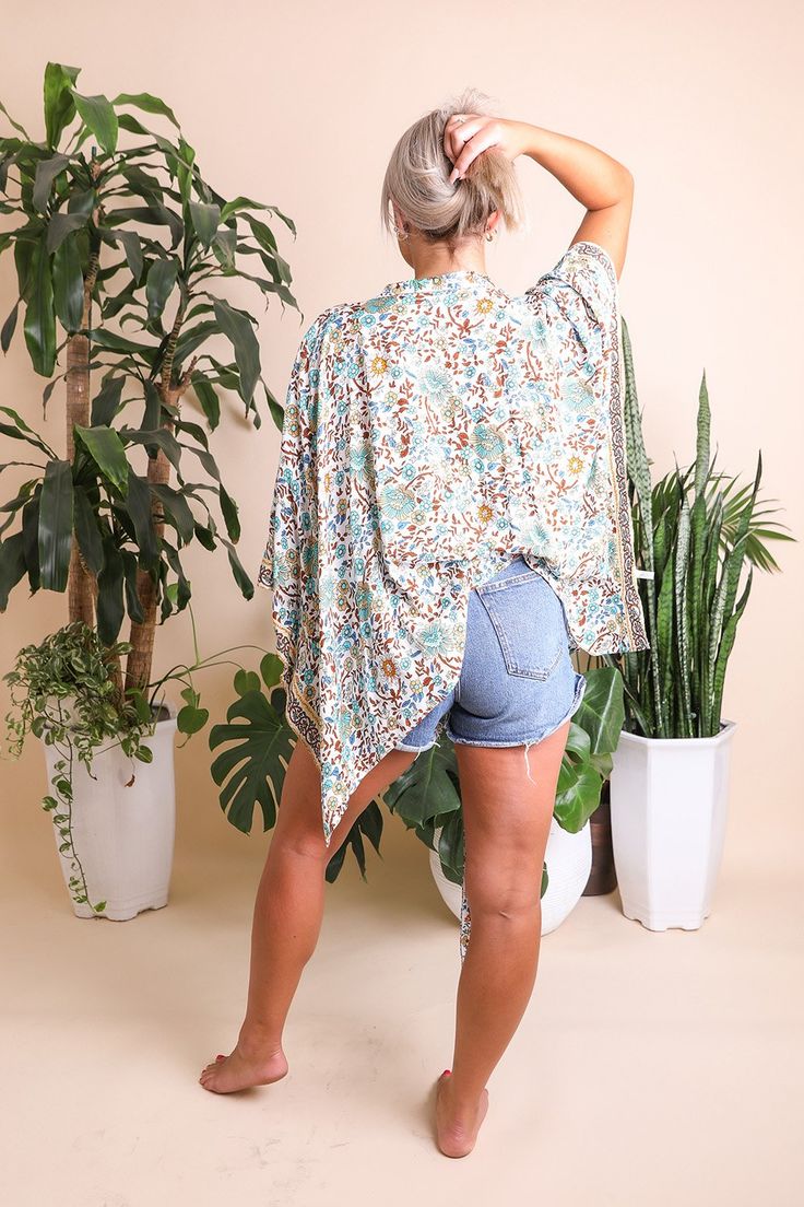 This flattering lightweight versatile floral cuteness is the perfect casual coverup for summer outings. Just pop a bathing suit and a straw sunhat, and you're ready to go! #lovemyleto 100% Viscose Imported Floral Wrap Top, Boho Shawl, Rush Dresses, Kimono Wrap, Bridal Shower Dress, Floral Robes, Shower Dresses, Western Boho, Layered Tops