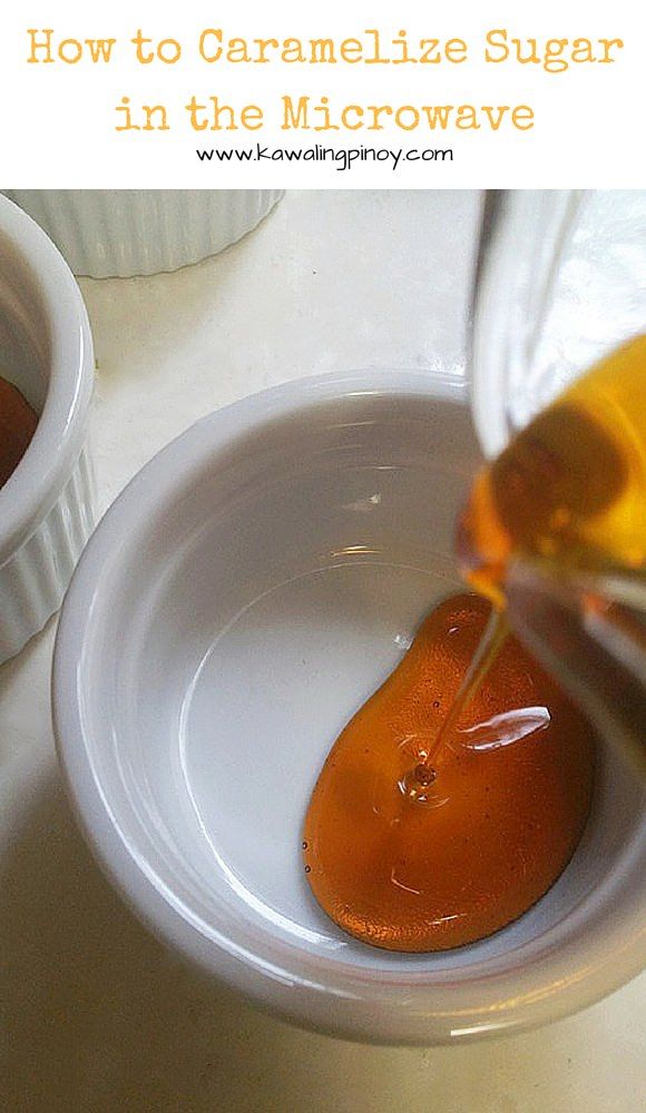 a bowl filled with liquid next to two white bowls full of sauce and an orange peel