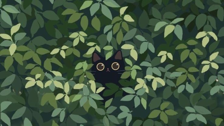 a black cat peeking out from behind some green leaves