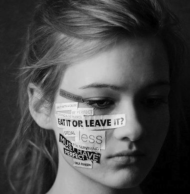 a woman with some words taped to her face