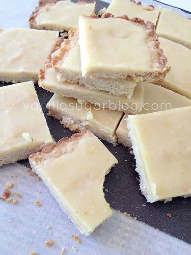 pieces of cake sitting on top of a cutting board