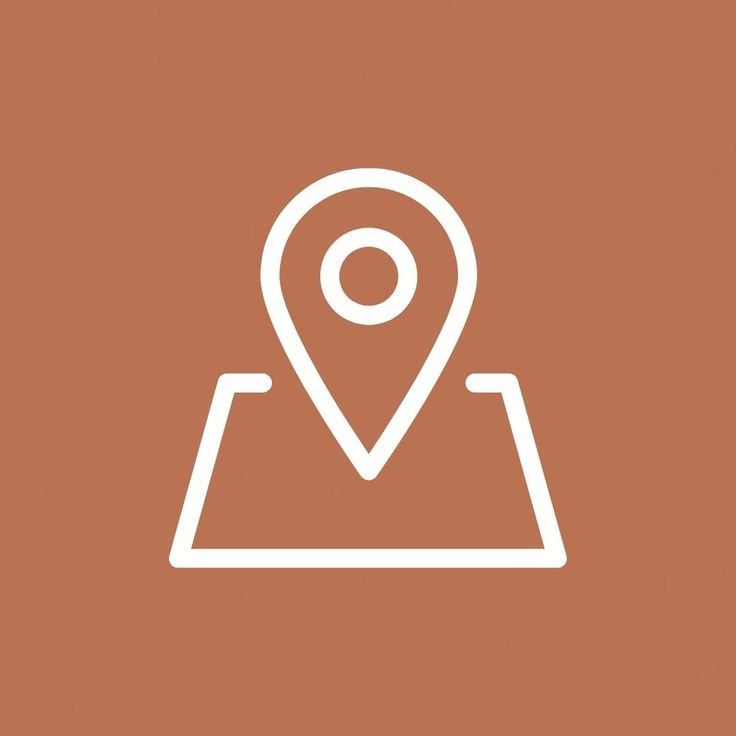 a map pin icon on a brown background