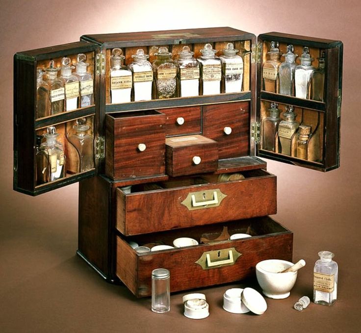 an assortment of spices and condiments are arranged in the shape of a chest